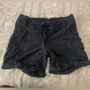 Lululemon Active Black Shorts, size medium, 16 inch waist, 5 inch inseam.